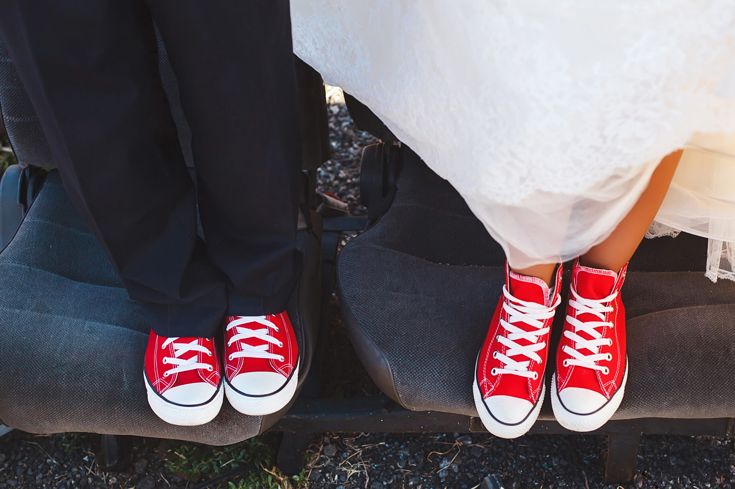 A bride and groom in red sneakers at their Johannesburg wedding